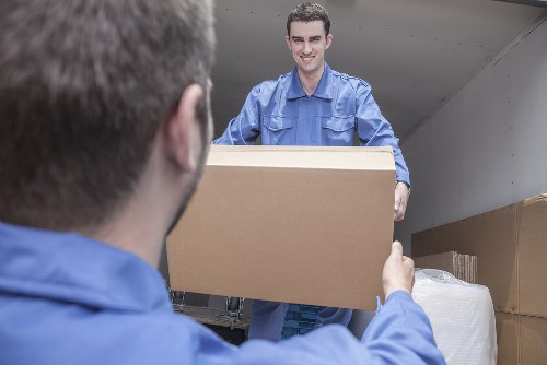 Local movers handling furniture and boxes for a Belsize Park move