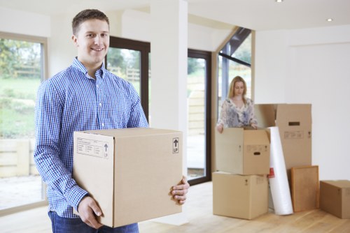 Loading household items for a removals van in Belsize Park