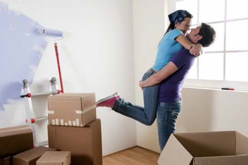 Local moving team handling boxes and furniture in Belsize Park