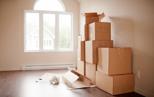Furniture and boxes prepared for transport by removals van