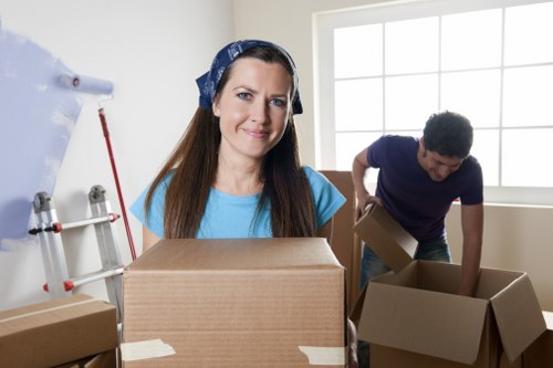 Moving day preparation with packed boxes and furniture