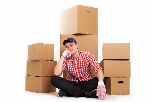 Movers handling office items in a local Belsize Park property