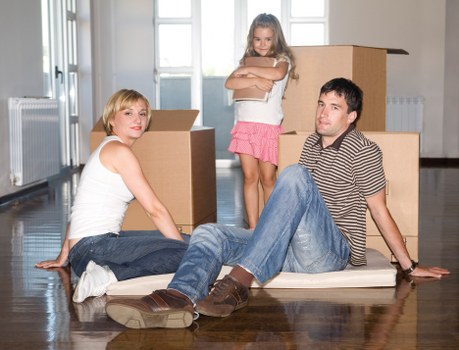 Packed boxes and furniture ready for transport during a local move